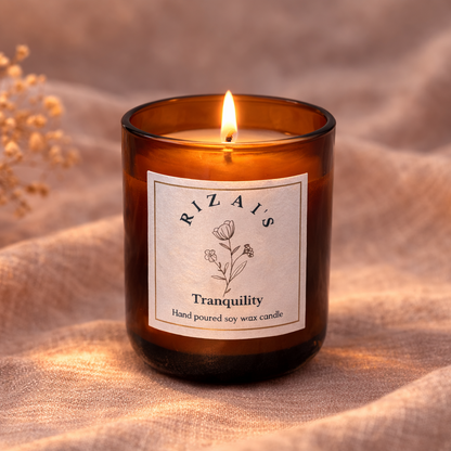 Tranquility rizai's candle with a label on a textured fabric background